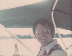 Tom Rozum in his boat (1976)